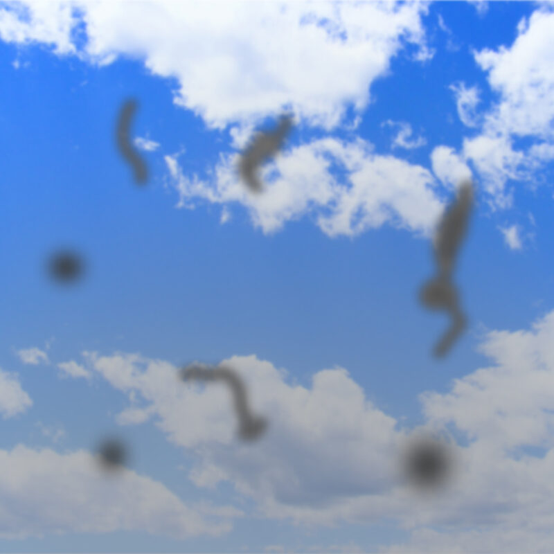 Simulation of floaters against a blue sky