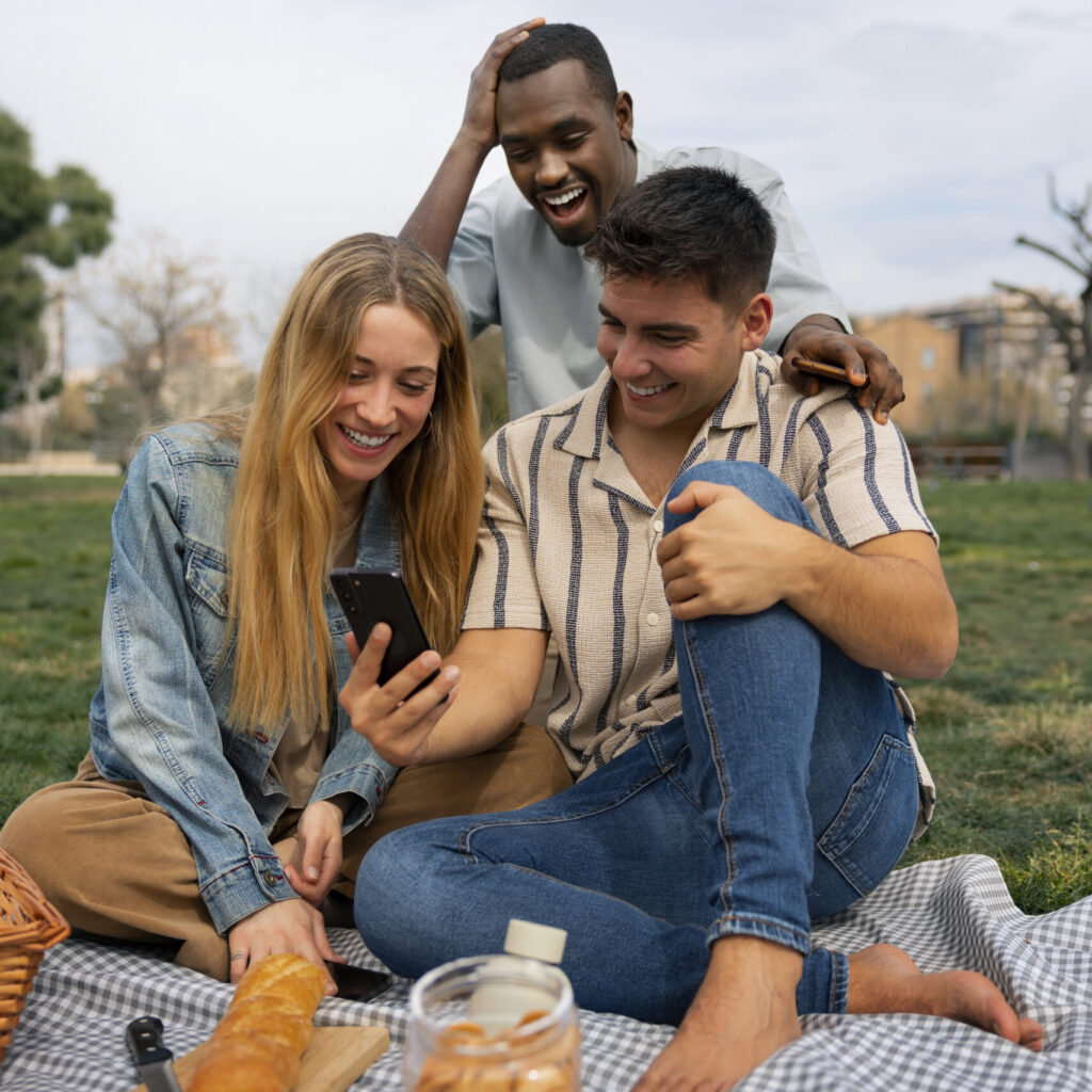 group of friends reading cell phone messages